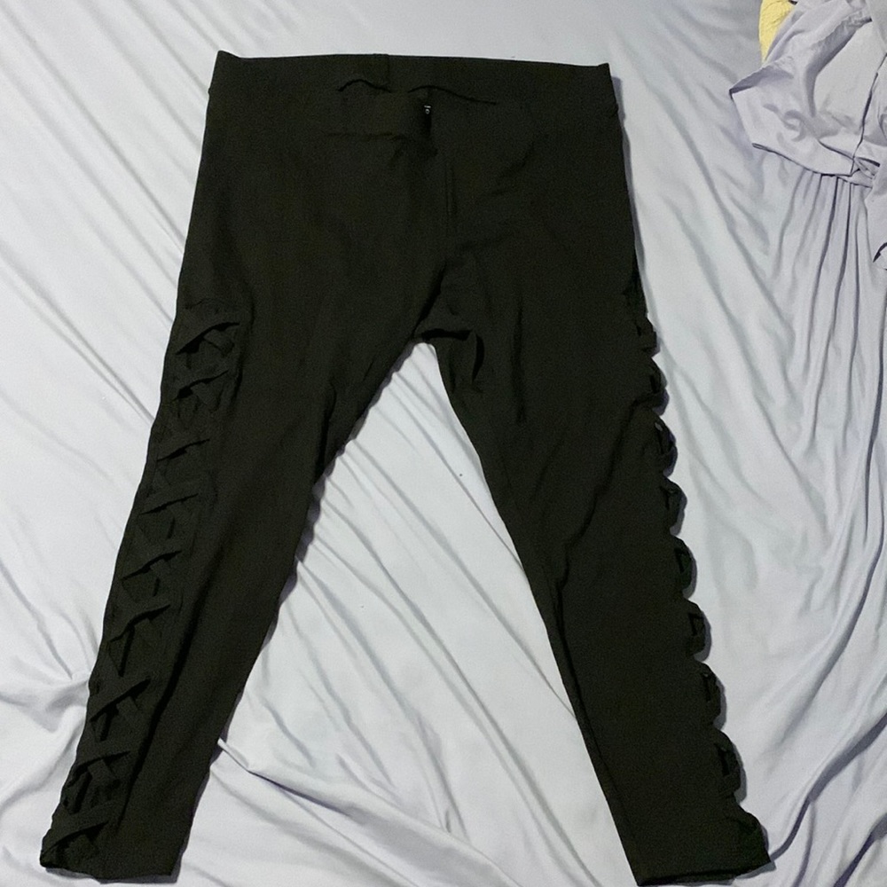 Torrid leggings. Size 3 (22/24) criss cross cutout design w/ mesh layer on legs